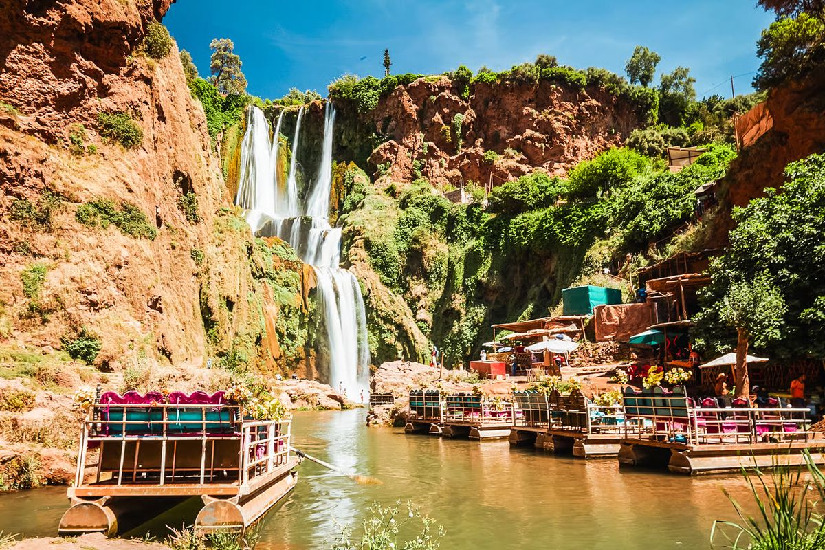 Traditional boats waiting in the pool at the foot of the Ouzoud Waterfalls