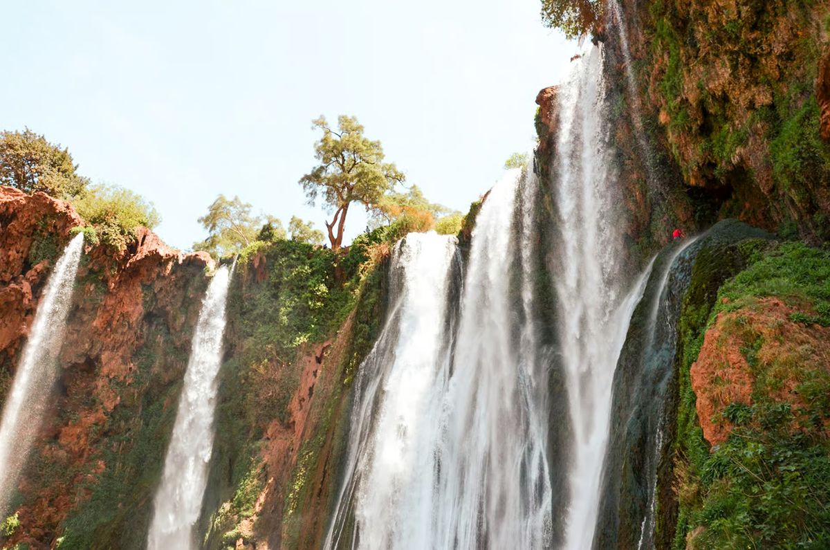 Close-up of the Ouzoud Waterfalls pouring over red cliffs
